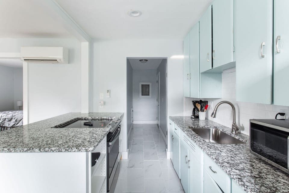 Clean and Cool Kitchen, with restored original "Well Built" vintage cabinets
