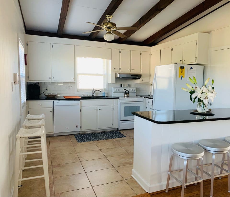 Extra Seating overlooking Fully Equipped Kitchen