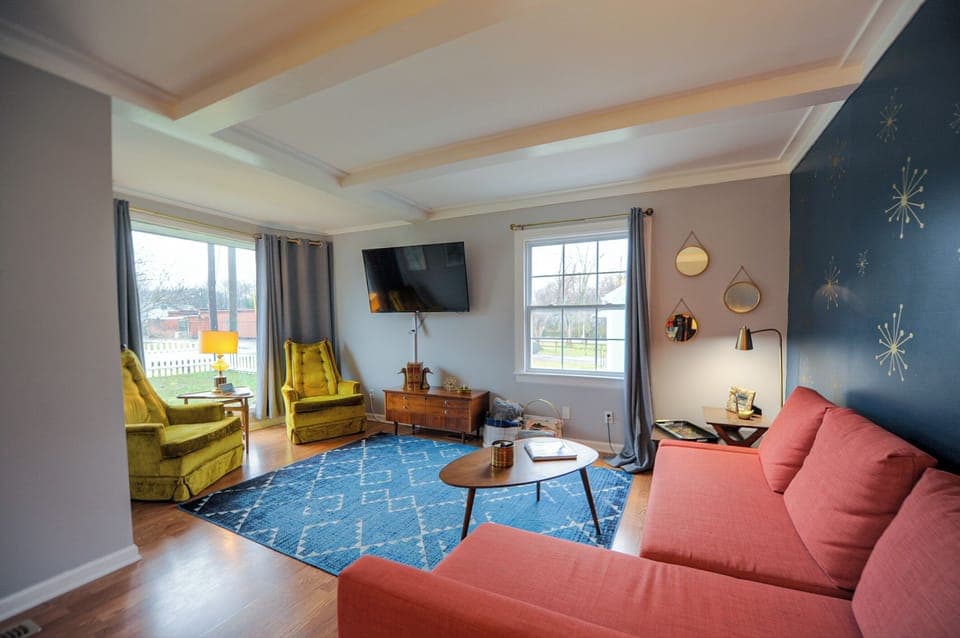 Get comfy in our retro living room.  Nothing retro about that Roku Smart TV!