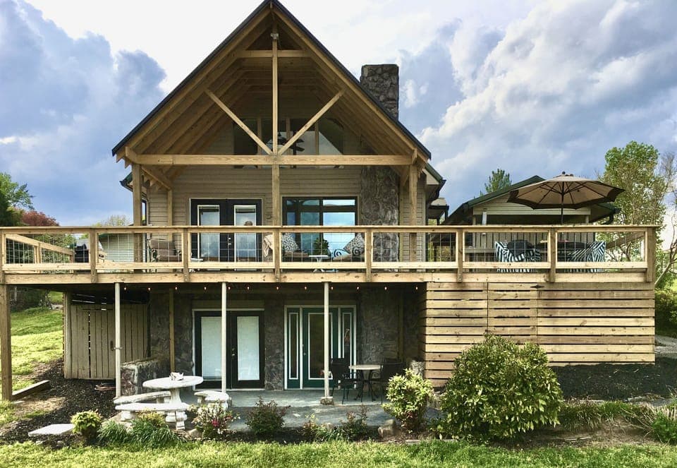 Covered Rear porch looking over the lake. 