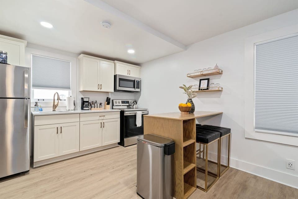 The kitchen is well-equipped with cooking and baking necessities
