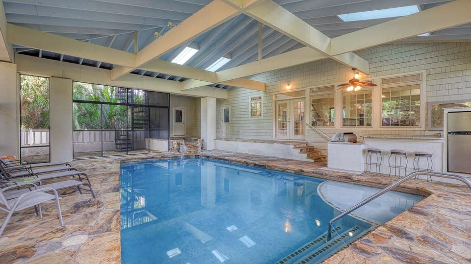 Screened in Pool and Spa Area with Grill Area (Pool and spa heat can be added for an additional cost)