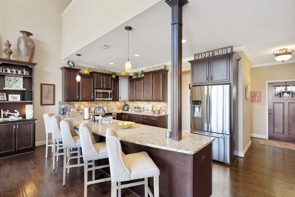 Gourmet kitchen, lots of granite counter space and expansive views. 