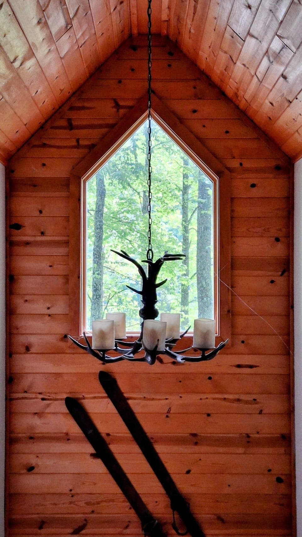 Cathedral window and chandelier