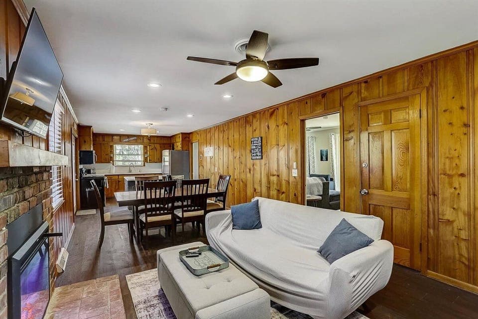 The open doorway behind the sofa here is the front living area.