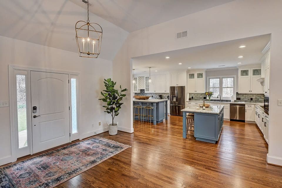The foyer opens into a spacious open concept floor plan.