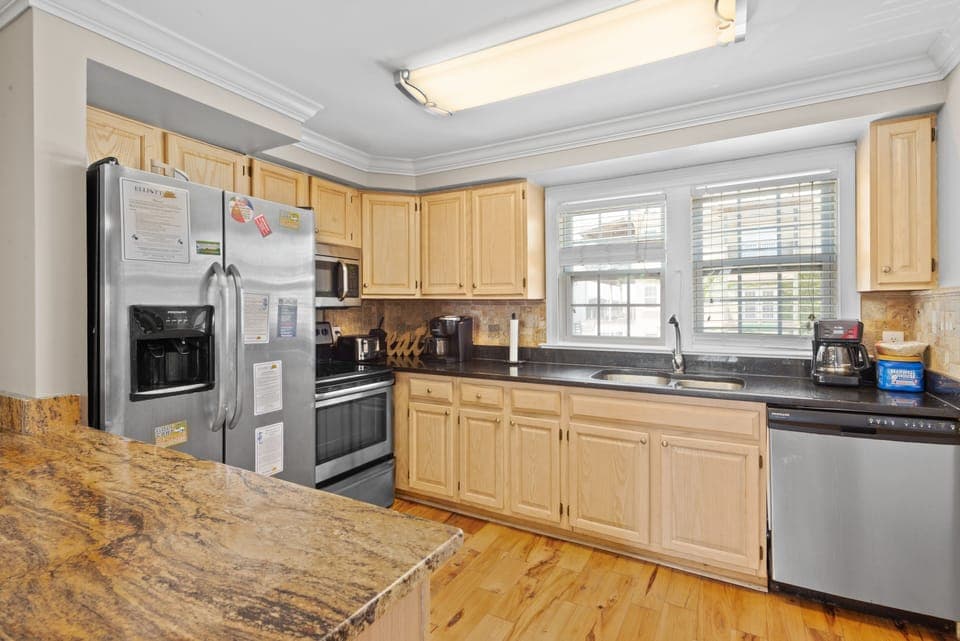 Not one, but two fully equipped kitchens provide extra room for cooking meals.