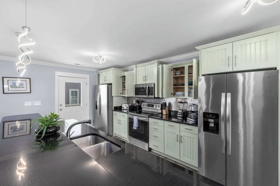 Cook up a feast in the fully equipped kitchen featuring stainless steel appliances. Dishwasher for easy clean up. Coffee maker for all the 