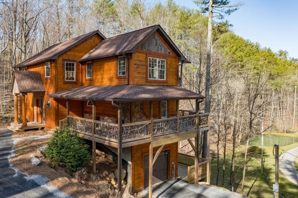Welcome! Front door to the left; main & lower level decks; private pond on right