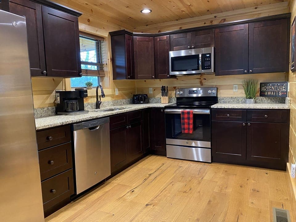 Plenty of counter space and 4 place stove with electric oven and microwave
