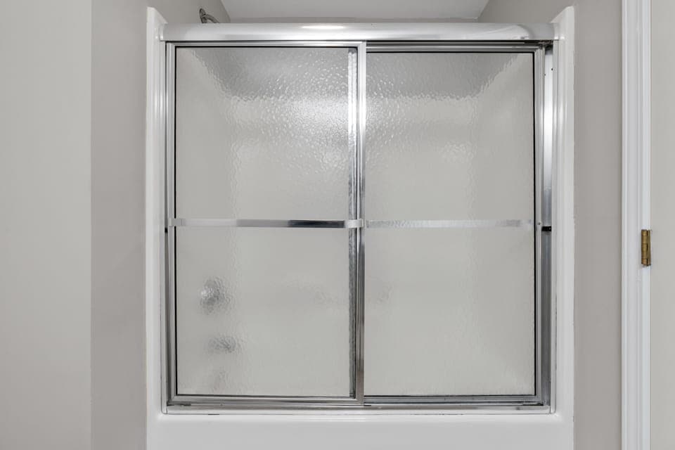 A spacious bathroom is just the place to wash away the sand.