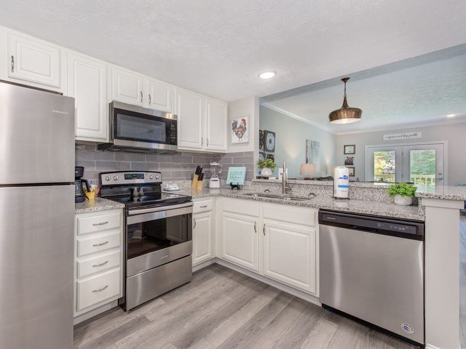 Fully Equipped Kitchen with Stainless Steel Appliances