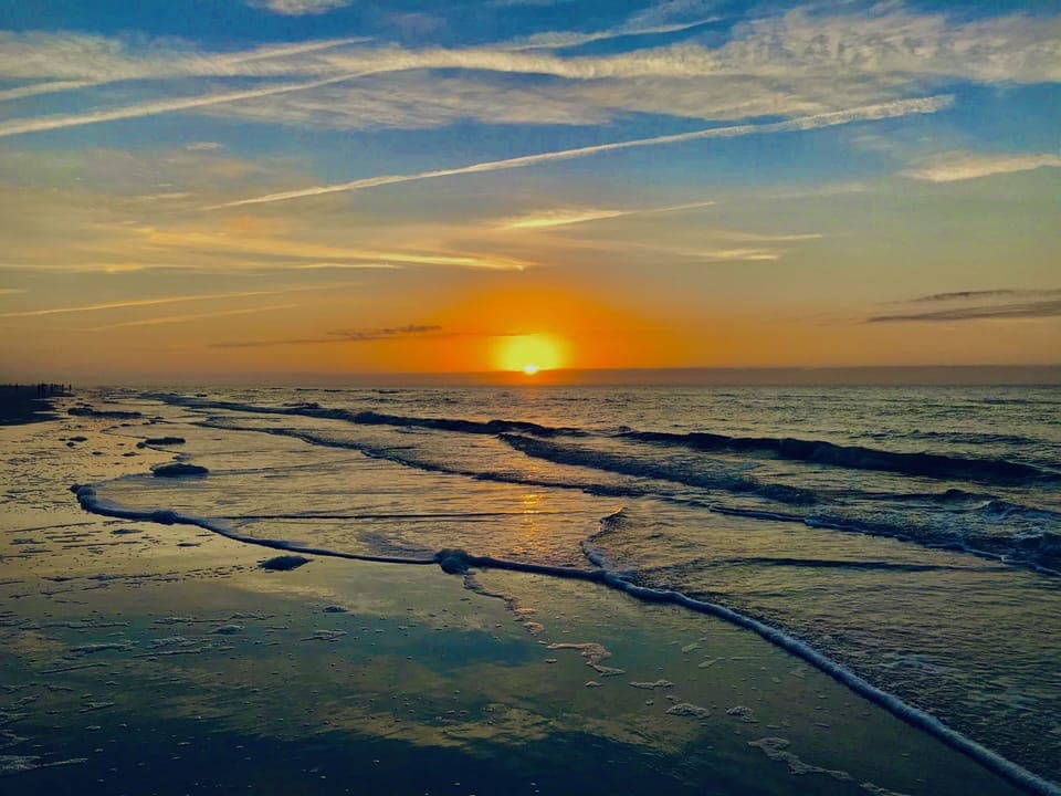 Sunrise on the beach in front of our condo! 