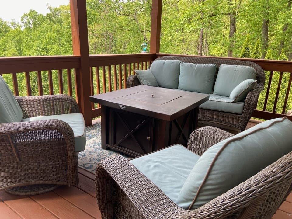 Outdoor living with a fire table and priceless views! Sonos speakers above.