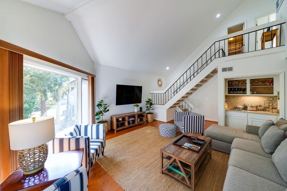Welcome to an open spacious living and dining area with hard flooring throughout.