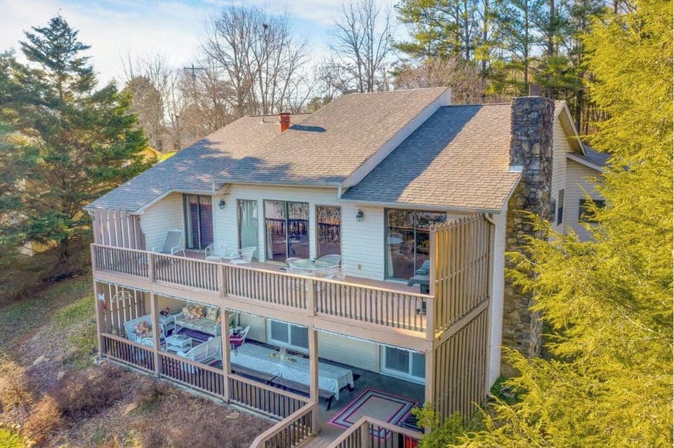 Lots of room to relax with views of the lake across a gently sloping lawn!