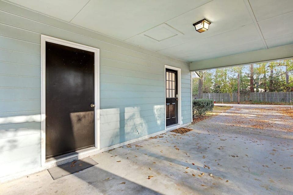 A view of the carport and entry to the home