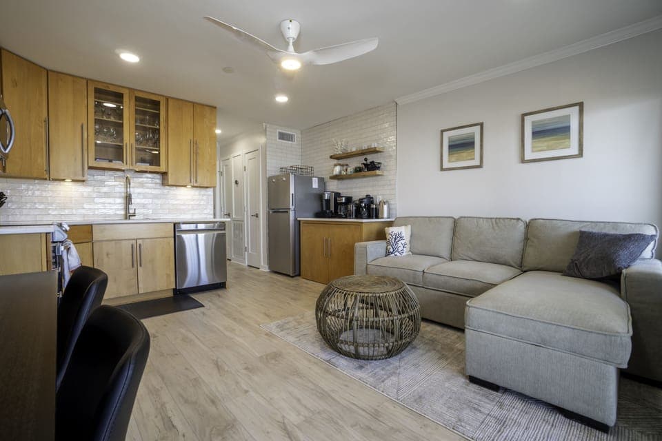 4 foot coffee bar w/ two bar stools and couch that converts to queen bed