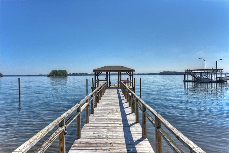 Enjoy the covered dock for swimming or to park your rented boat.