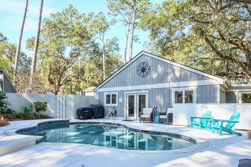 Beautiful private pool with fenced yard and plenty of deck space to entertain and features a gas grill and Blackstone griddle!