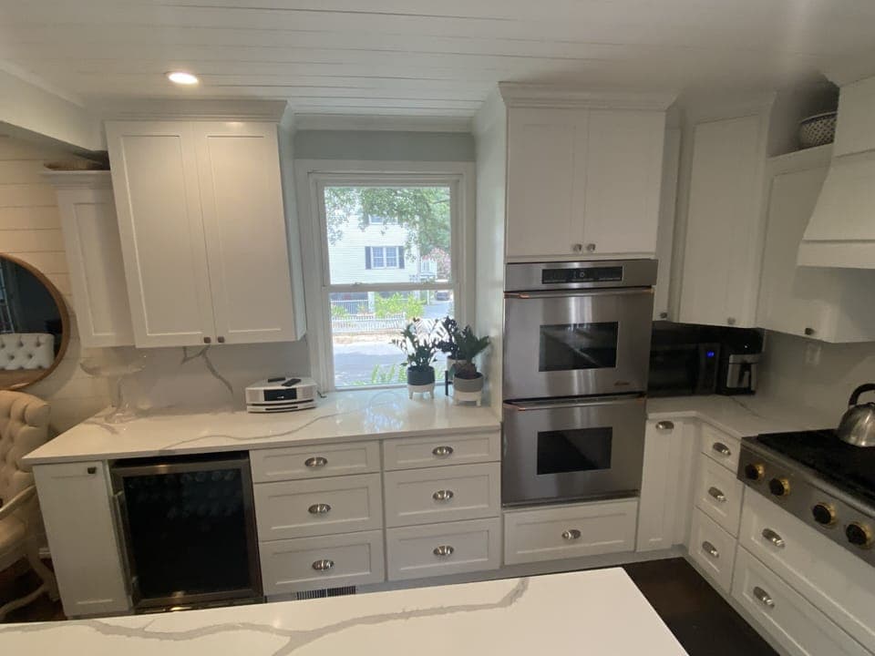 Beverage refrigerator  and double oven to cook and entertain large groups.