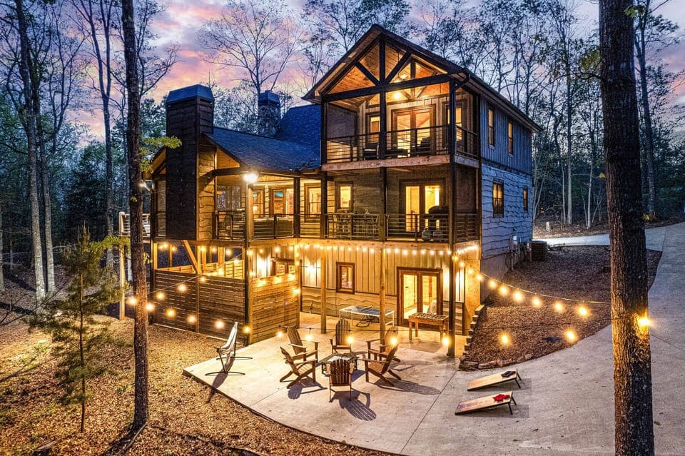 This exclusive home features upscale amenities and outdoor entertainment, in a natural wooded setting