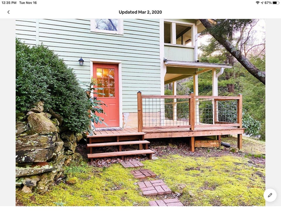 Entrance into the downstairs. Also leads to back porch with grill. 