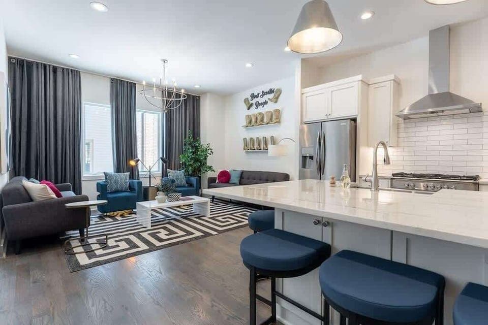 Free-flowing kitchen and living space for continuous chats.