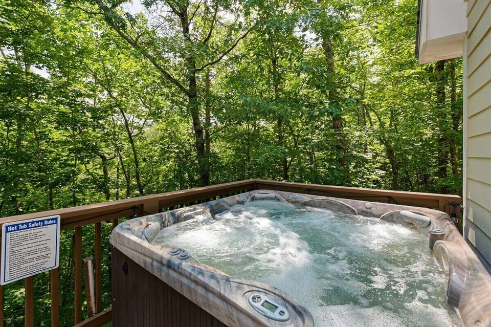 Main Level Deck with Hot Tub, String Lights, BBQ Grill & Outdoor Dining Table