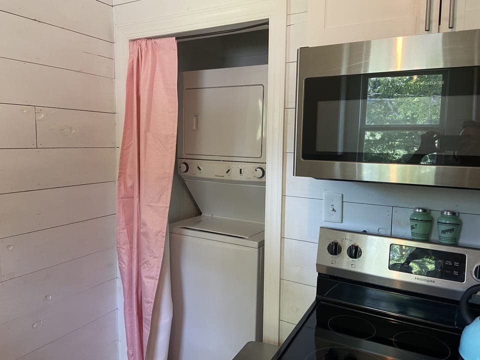 The laundry is easily accessed in the kitchen.