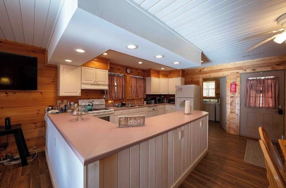 Complete with pots, pans, pancake griddle,  crockpot, microwave & coffee pot.