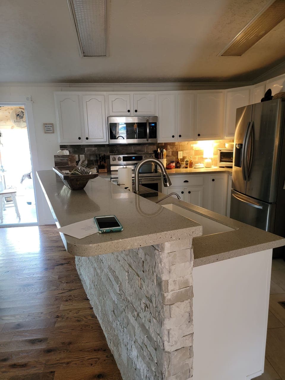 Spacious kitchen with Samsung stainless appliances 