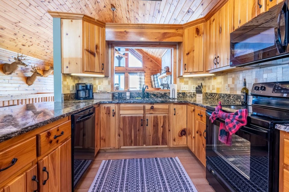Fully-stocked kitchen with upgraded appliances. 