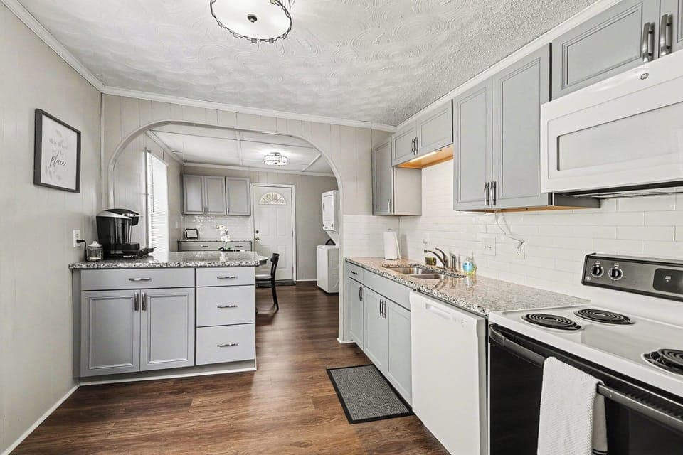 Open flow between living, dining, and kitchen
