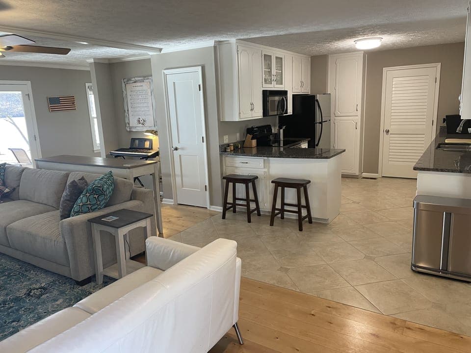 Kitchen open to the living room and dining room.  All accessories included.