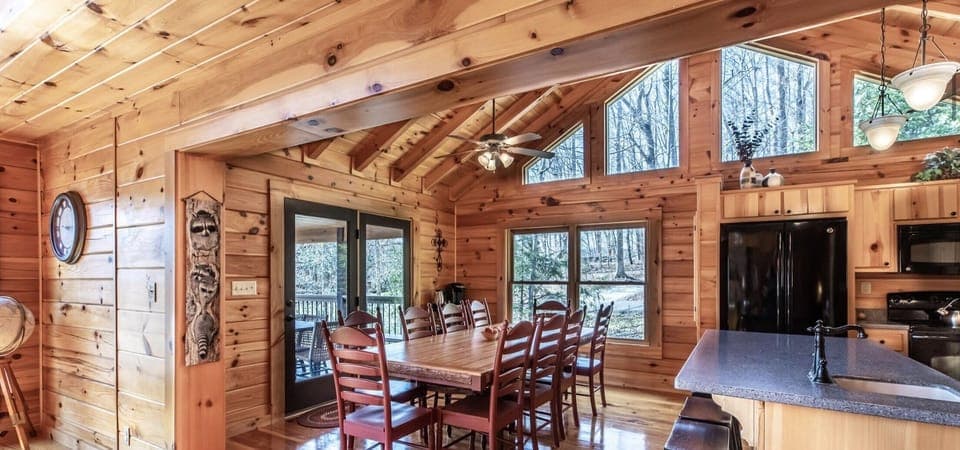 10-person dining table in open kitchen layout.