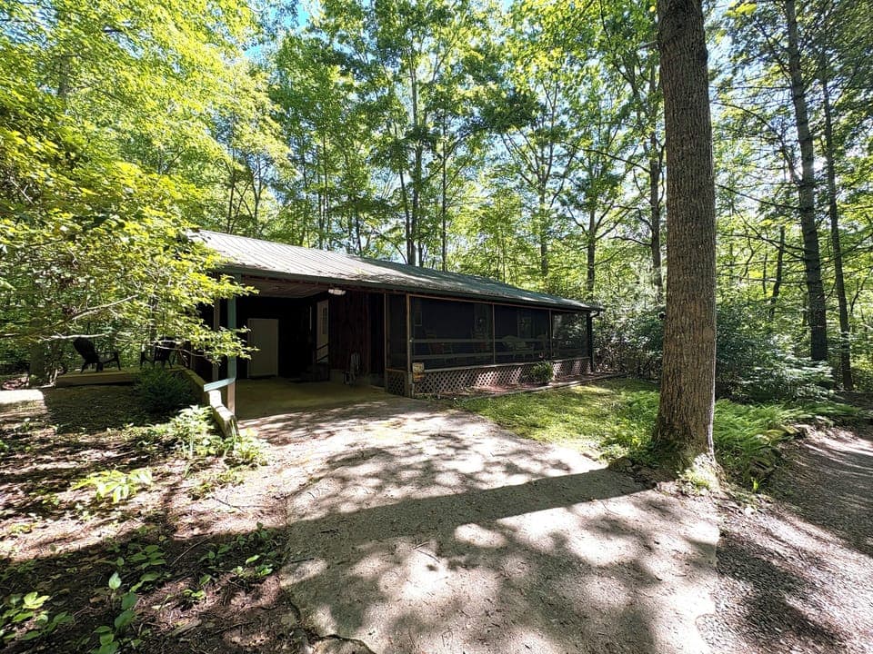 Exterior of the cabin and carport