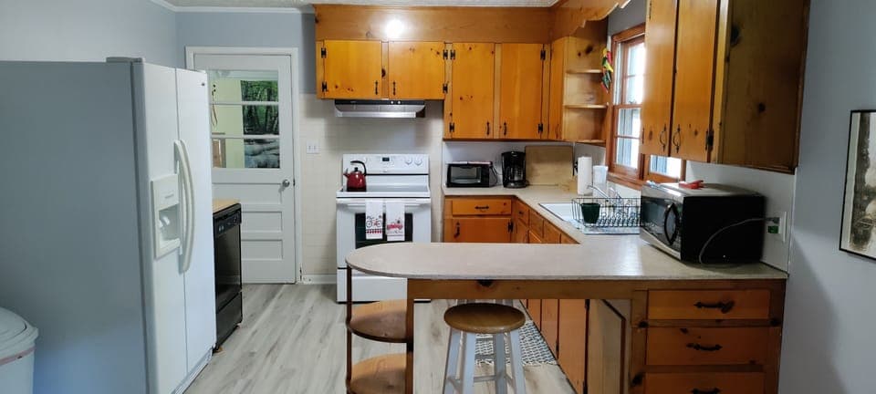 Counter seating of kitchen area and entrance into game room