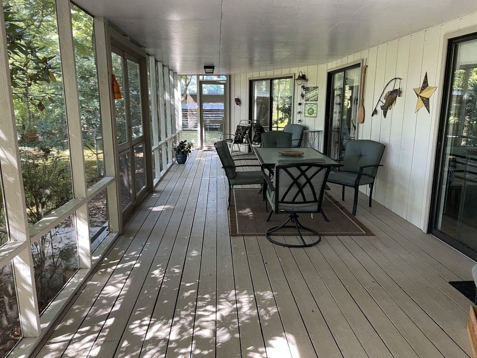 Dining table on porch, seating for 6. 
