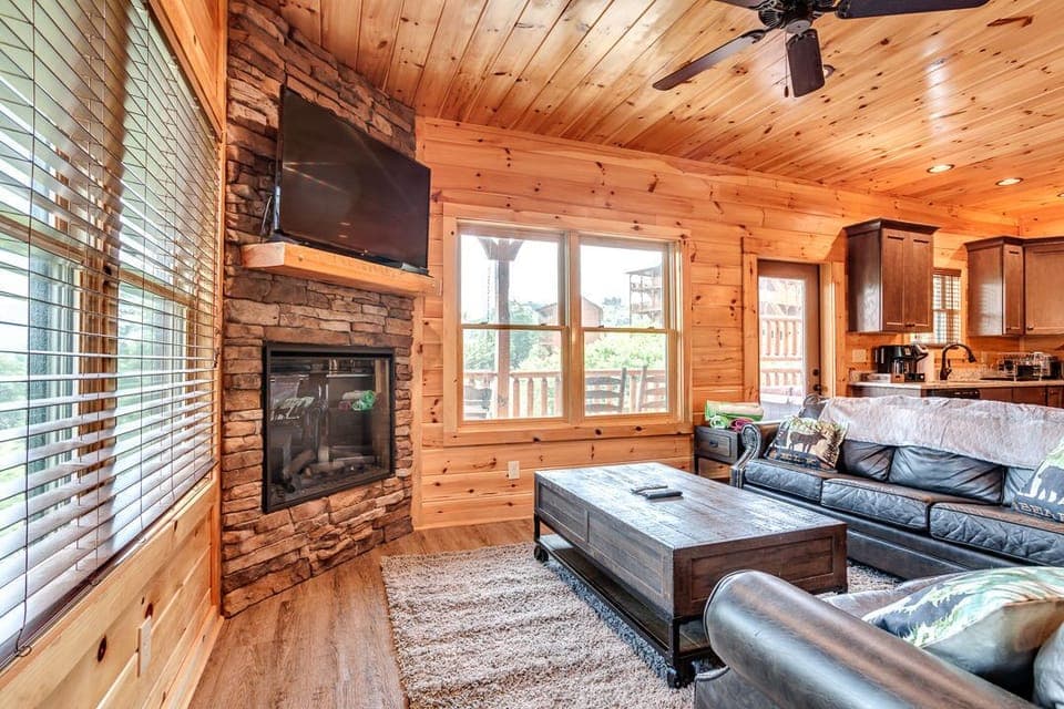 Take a seat in front of the fireplace and enjoy a movie in the living area.