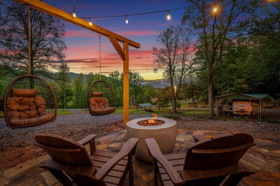 Flagstone patio w/ propane fueled fire pit and string lights