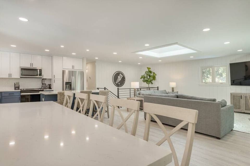 Kitchen table with view of living room tv. 