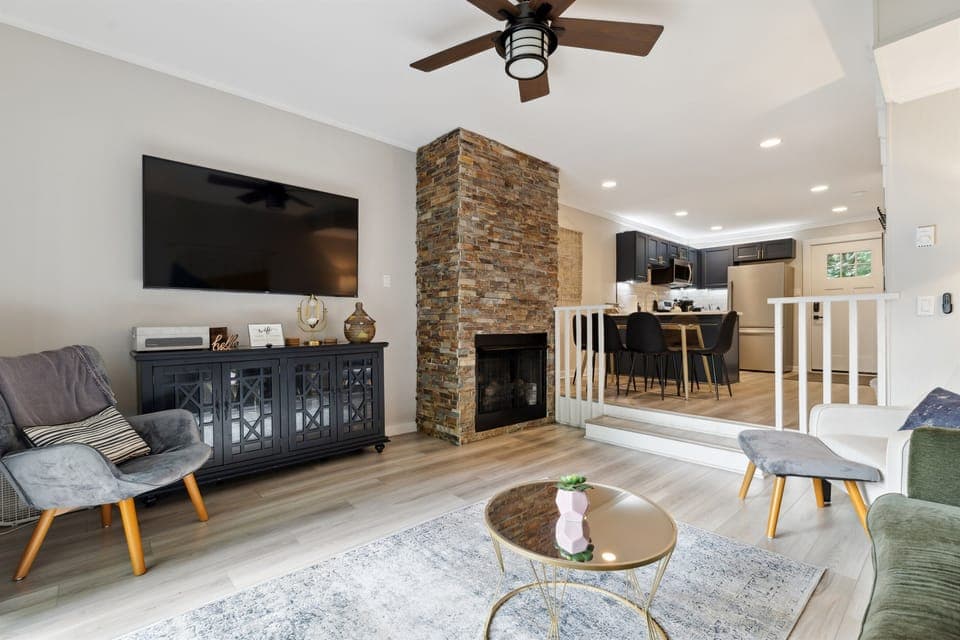 Enjoy the cozy living room with a gas fireplace and a Roku TV