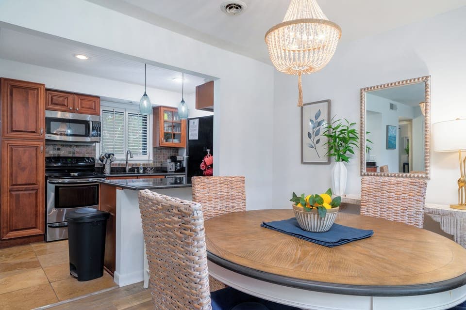 The kitchen breakfast bar has stool seating for two