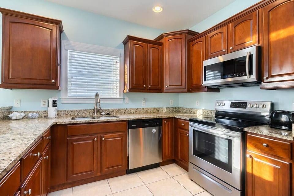Fully equipped kitchen including stainless steel appliances