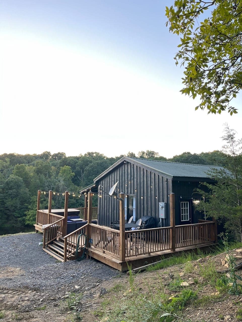 Outdoor dining table, sectional, propane fire pit, and hot tub
