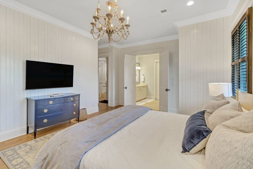 Bedroom 4 with King, TV, and en-suite. First Floor