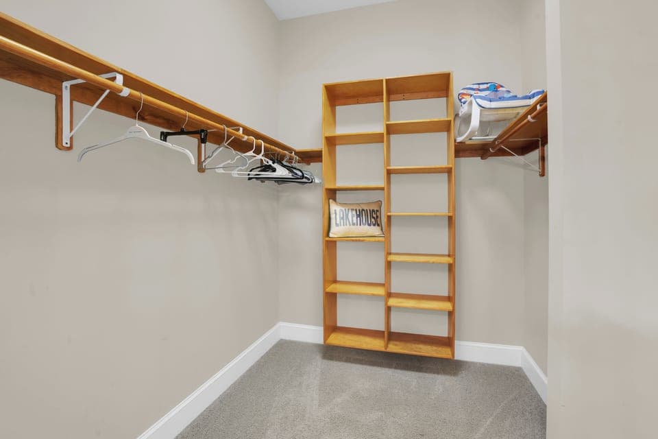 Spacious walk-in closet with built-in shelving