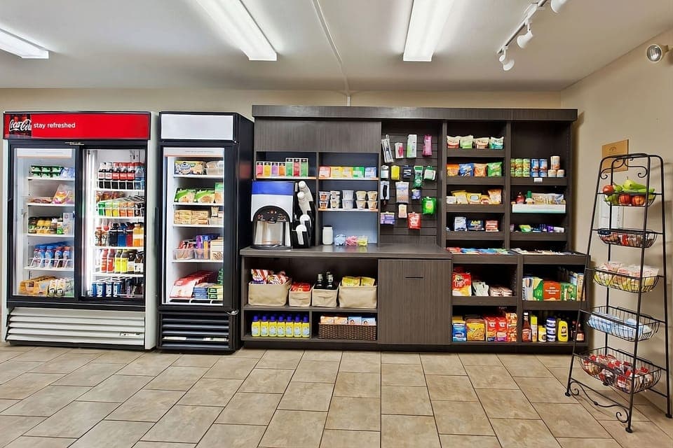 Grab snacks and essentials anytime from the convenient on-site market.