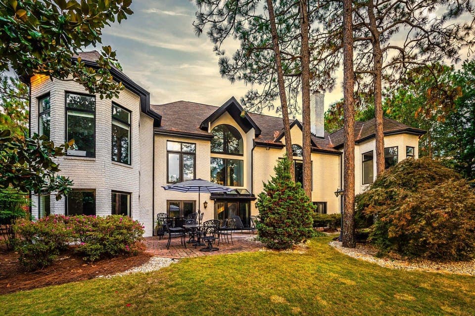 The Abbey Manor on Pinehurst No 6 is an enormous masterpiece with stunning golf views of the 14th hole.